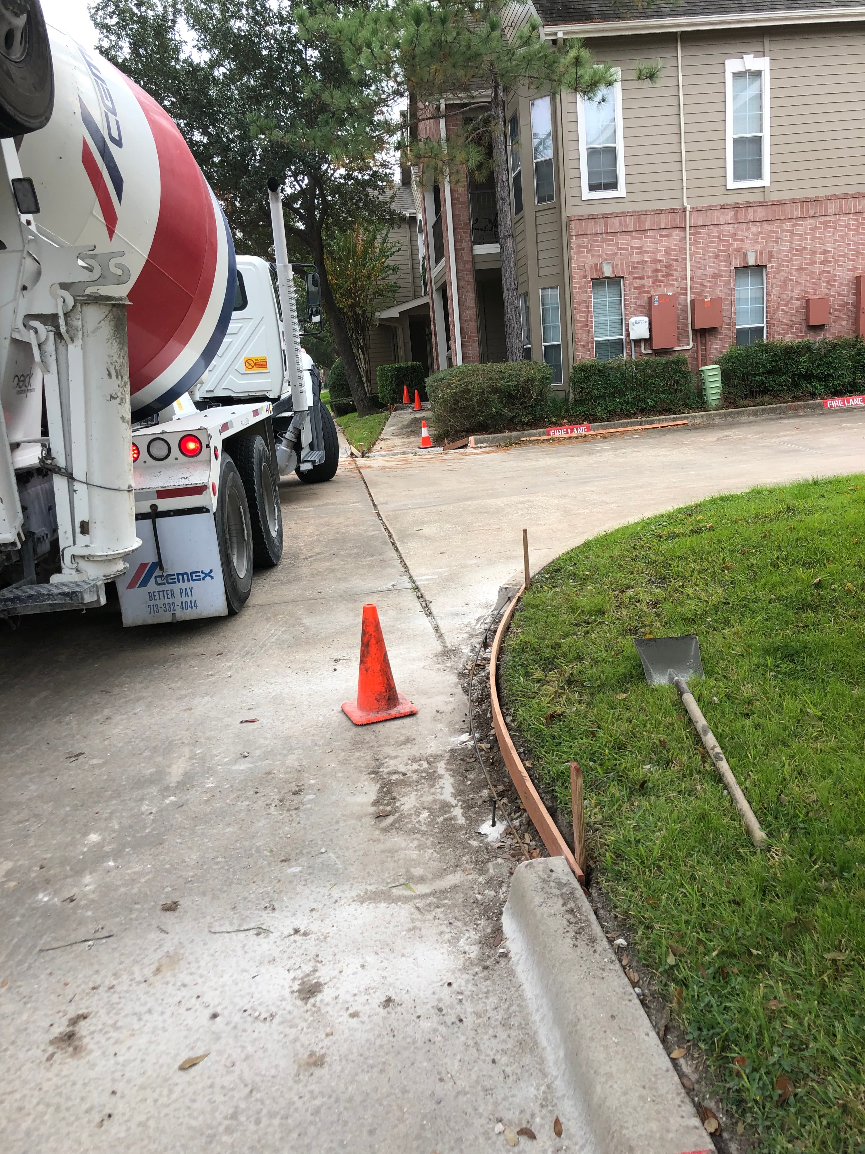 Concrete truck on site for a residential driveway pour