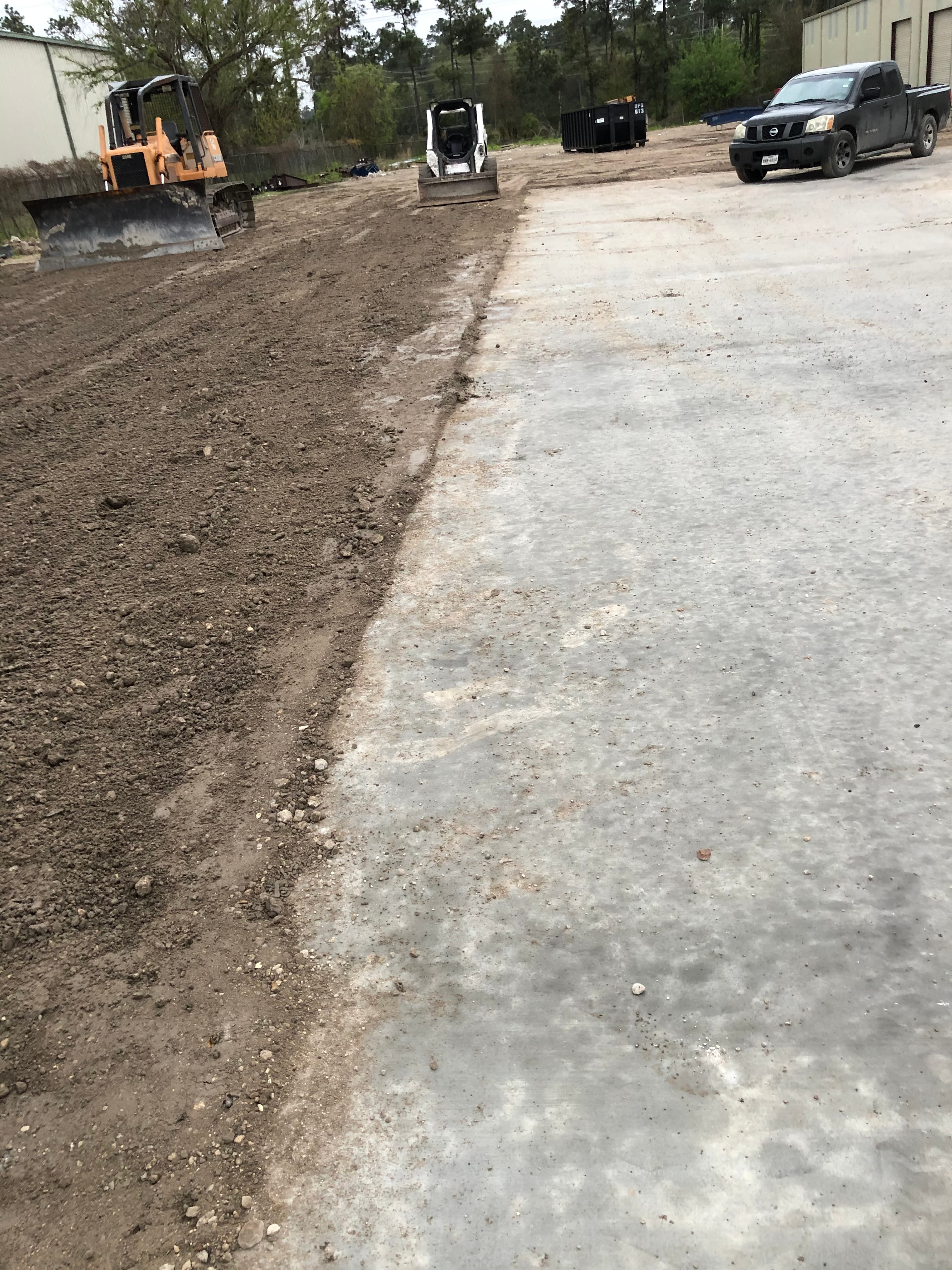Finished concrete pad at a Houston-area commercial job site