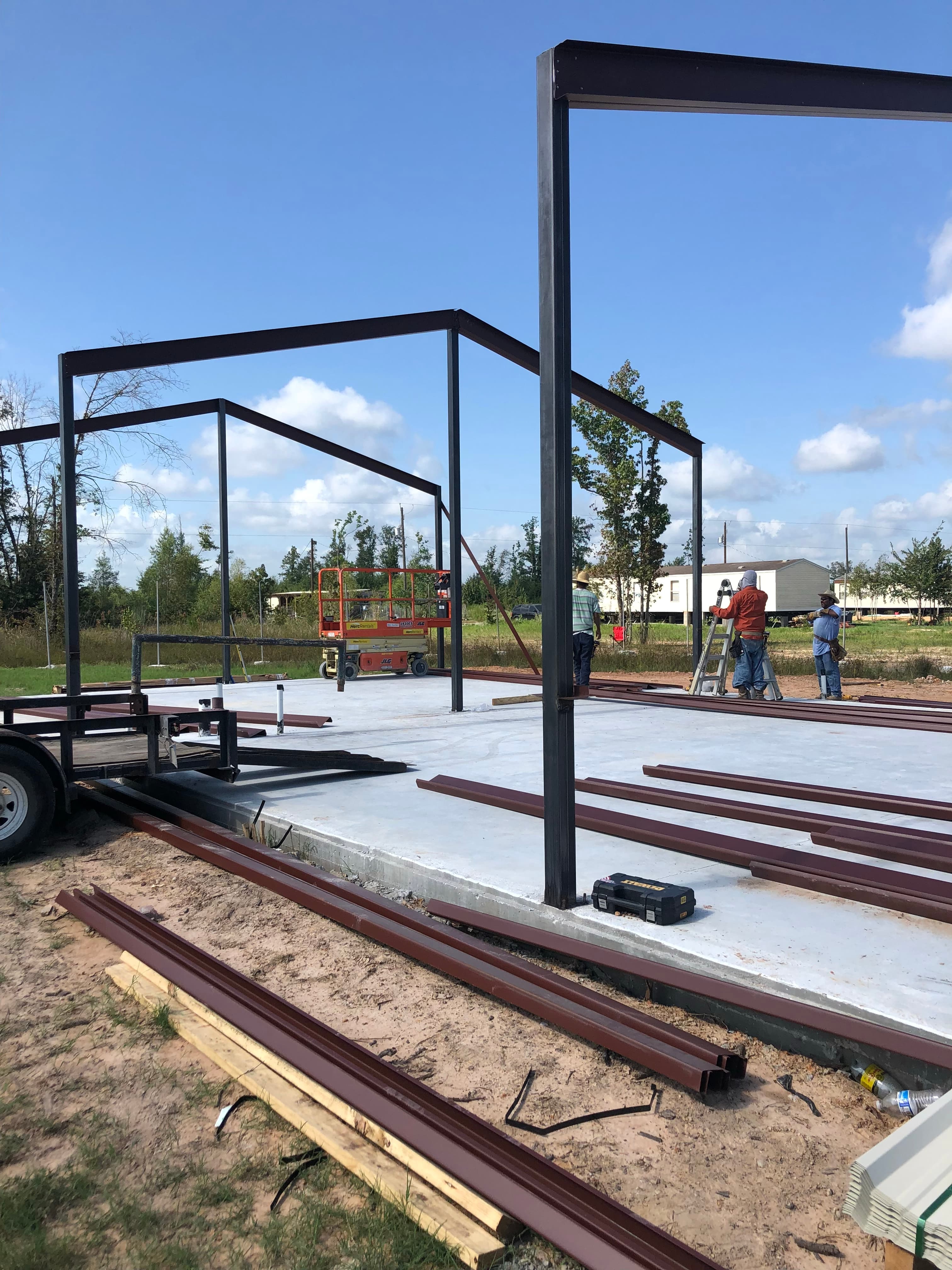 Commercial steel building going up ahead of an Iron Wolf Concrete pour