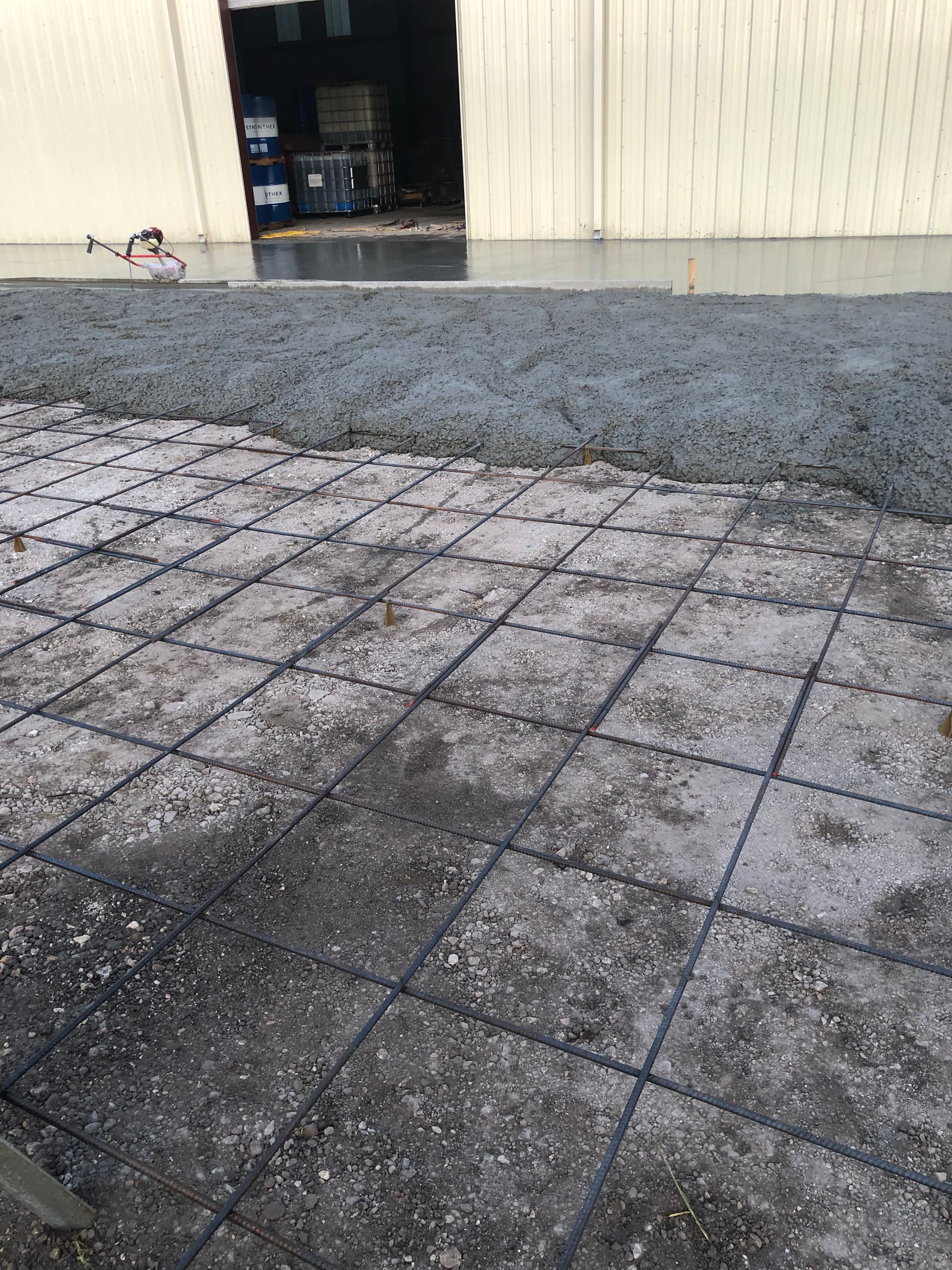 Freshly framed and reinforced concrete slab ready to replace old concrete